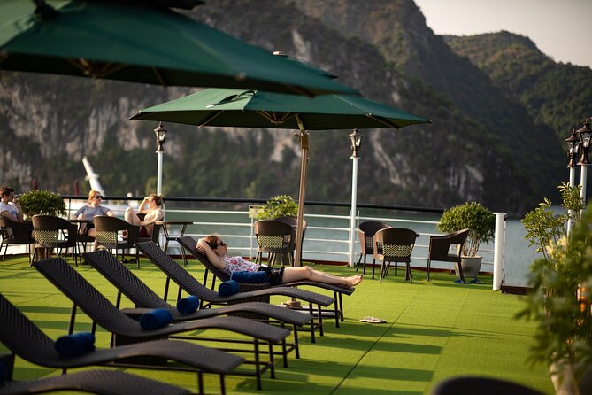 All-Inclusive 2 Day/1 Night Halong Luxury Cruise, Meals, Cave, Kayaking,Swimming - Sunset, cooking, Tai Chi, and squid fishing