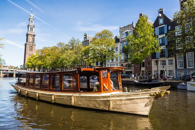 Amsterdam Classic Saloon Boat Canal Cruise with Live Guide - Why a canal hour can explain Amsterdam better than a museum