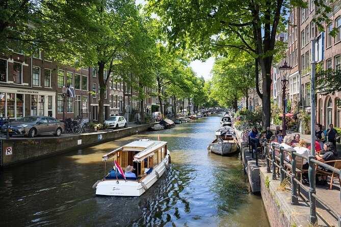 Amsterdam High-End Dutch Food & History Tour - Up to 8 guests - Fish shop flavors: herring, cod, and smoked eel