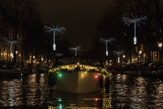 Amsterdam Light Festival: Canal Cruise + Snack & Unlimited Drinks - Covered boats, plastic windows, and the winter problem