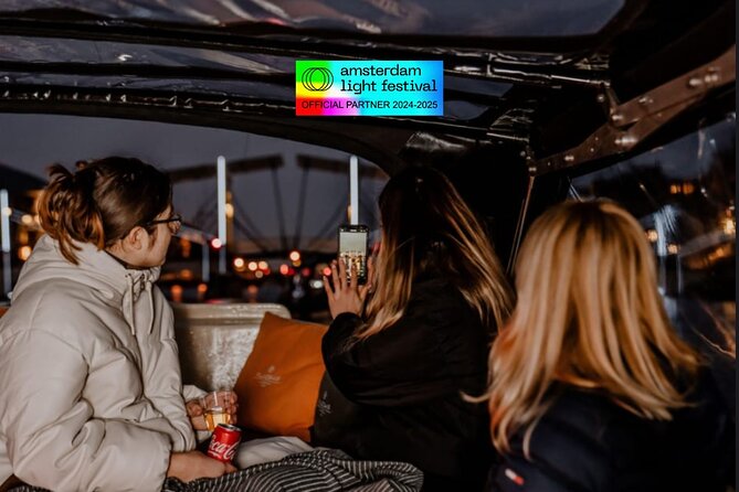 Amsterdam Light Festival: Cruise Unlimited Drinks & Bite option - Open-air views, plastic panels, and winter weather