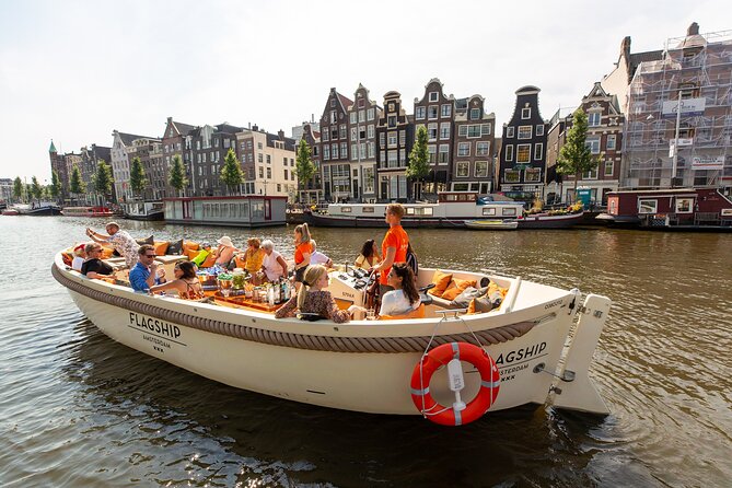 Amsterdam Luxury Canal Cruise + Unlimited Drinks & Bites option - Jordaan’s trees, flowers, and leaning houses