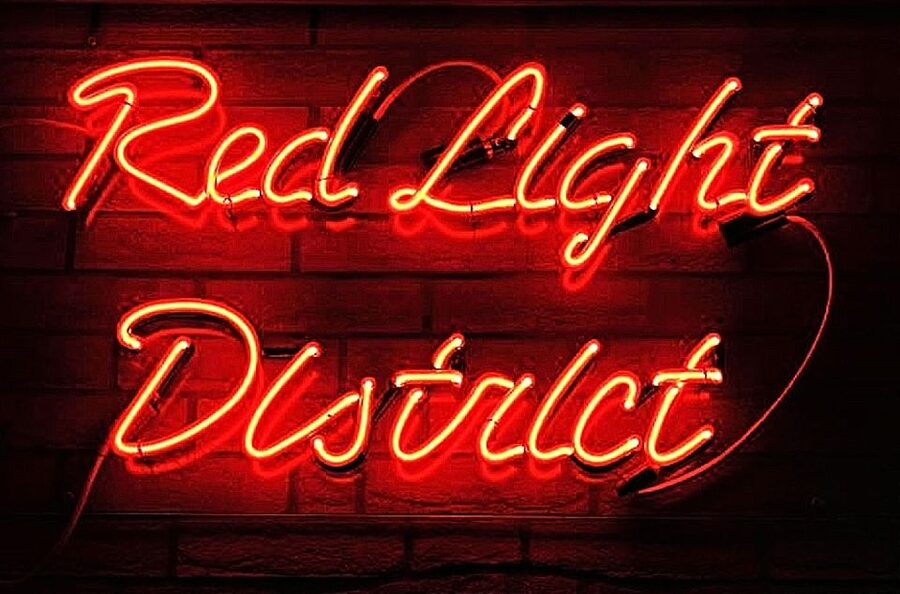 Amsterdam: Red Light District Exclusive Night Tour - Coffeeshops, smart shops, and the Condomerie