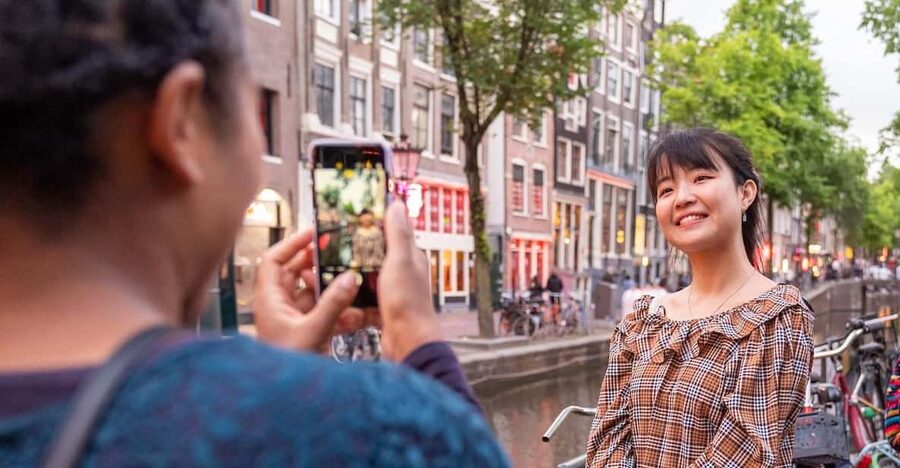 Amsterdam: Red Light Tour Exclusive + Peep Show - Oude Kerk, old streets, and the narrowest alley