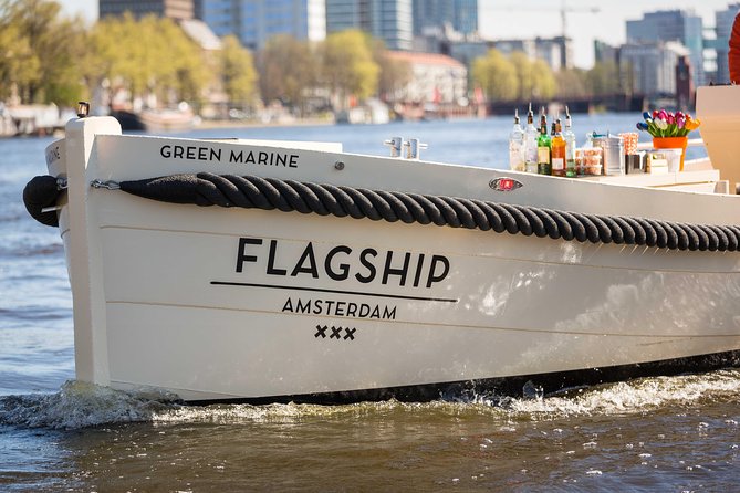 Amsterdam: Saloon Boat Cruise + Unlimited Drinks & Bite option - The Drunken Houses and Amsterdam’s crooked charm