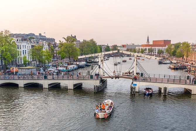 Amsterdam: Saloon Boat Cruise + Unlimited Drinks & Bite option - Spotting the Rijksmuseum and Anne Frank House area