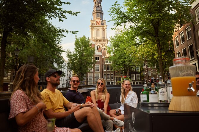 Amsterdam: Saloon Boat Cruise + Unlimited Drinks & Bite option - Zuiderkerk and Amsterdam’s old skyline