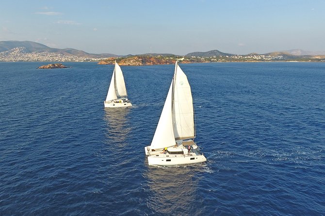 Athens Private Luxury Catamaran Cruise with Traditional Greek Meal and BBQ - Sailing past the Athens Riviera