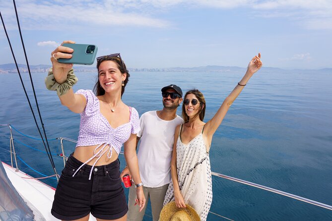 Barcelona Catamaran Cruise with Tapa & Drink Included - Daytime sailing and the 30-minute swim