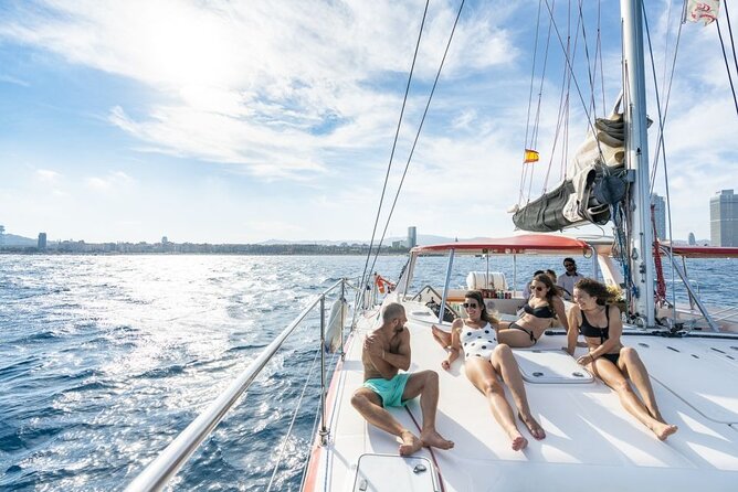 Barcelona Catamaran Cruise with Tapa & Drink Included - Sunset sailing and Barcelona’s evening colors