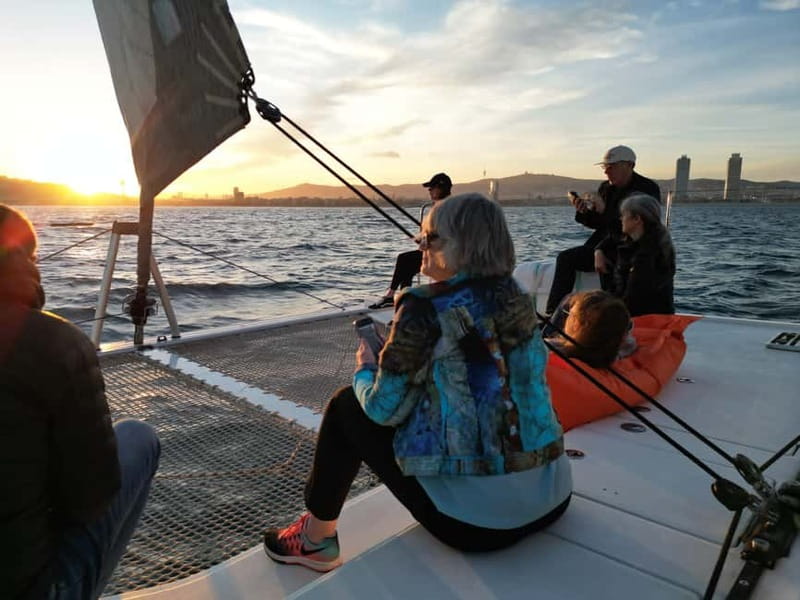 Barcelona: Luxury Catamaran Sunset Cruise - Sunset behind Barcelona