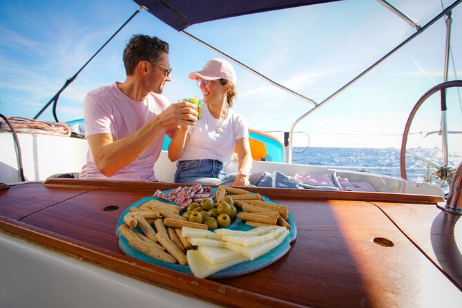 Barcelona Sailing Experience: Spanish Tapas and Premium Open Bar - The skippers shape the mood