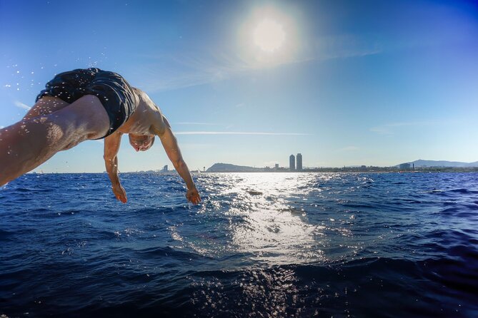 Barcelona Sailing Experience: Spanish Tapas and Premium Open Bar - Swimming, sunbathing, or staying dry