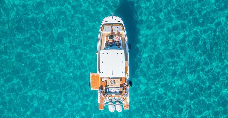 Cagliari: Luxury Motorboat Tour with 3 Swim Stops & Wine - Leaving Poetto Beach and Marina Piccola
