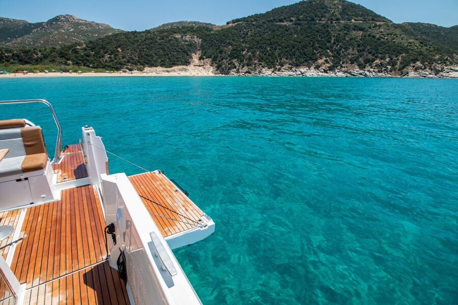 Cagliari: Luxury Motorboat Tour with 3 Swim Stops & Wine - Cala Fighera and the limestone coast