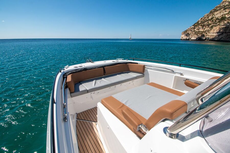 Cagliari: Luxury Motorboat Tour with 3 Swim Stops & Wine - What the boat feels like for three hours