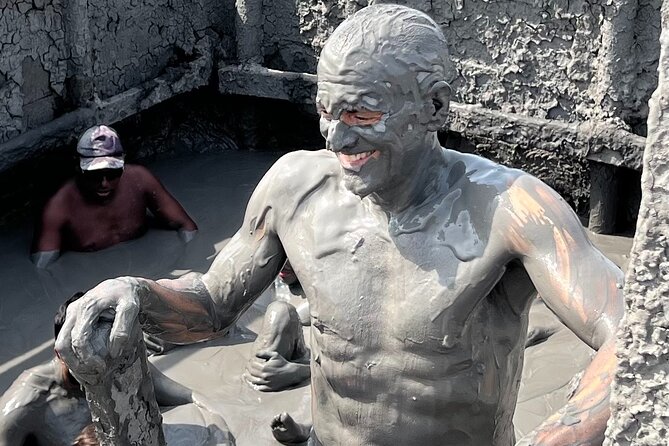 Cartagena Mud Volcano Tour — VIP Exclusive Crowd-Free Access! - Rinsing off at the lagoon