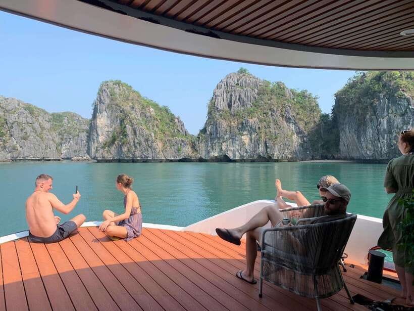 Cat Ba Island: Lan Ha Bay Full-Day with Luxury Cruise - Sunset tea, fruit, and the long ride back