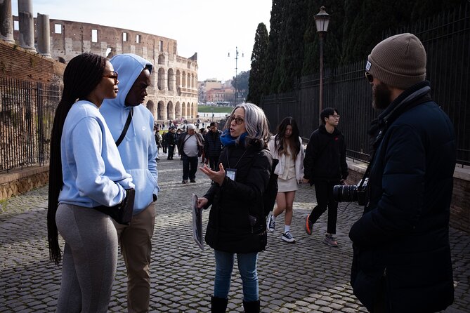Colosseum, Roman Forum & Palatine Hill Guided Tour - Walking the Roman Forum from the Via Sacra