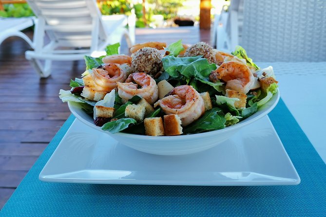Day excursion to a PRIVATE LUXURY BEACH CLUB with transportation. - Swimming, snorkeling, and the two-kayak question