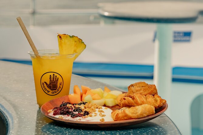 Deluxe Snorkel & Dolphin Watch Aboard a Luxury Catamaran from Kailua-Kona - The catamaran is the real family playground