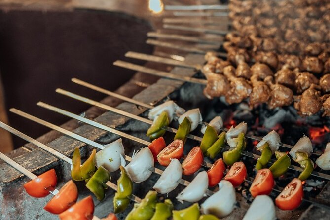 Deluxe Sunset Desert Safari: SandSurfing, Camel Ride & BBQ dinner - Arabic Coffee, Dates, and a Calm Start at Camp