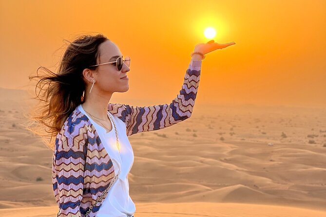 Desert Safari Tour with Camel Ride and BBQ Dinner in VIP Camp - Sandboarding and desert photos add a slower pause