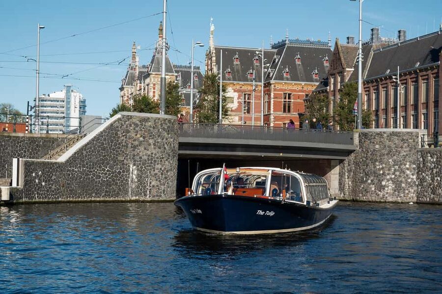 Discover Amsterdam: Luxury Canal Cruise with a Local Skipper - Live commentary and the multilingual audio guide