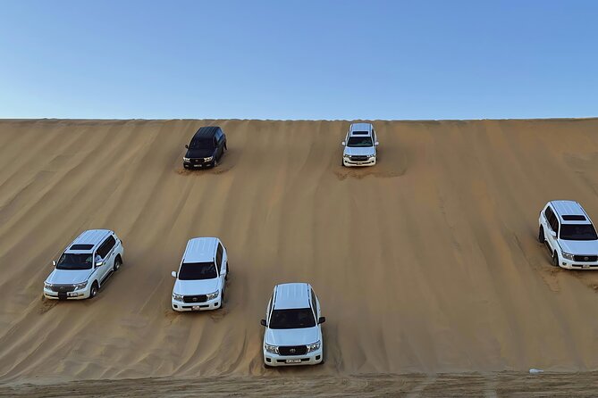 Doha: Luxury Desert Safari, Quad Bike & Sandboarding - Four hours from Doha to the Inland Sea