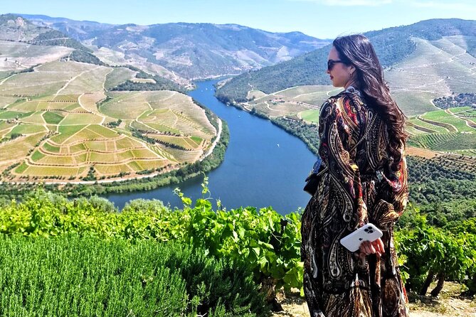 Douro Valley-Expert Guide-Boat-Lunch-Tastings-Offer wine bottle - A Rabelo boat puts you at river level