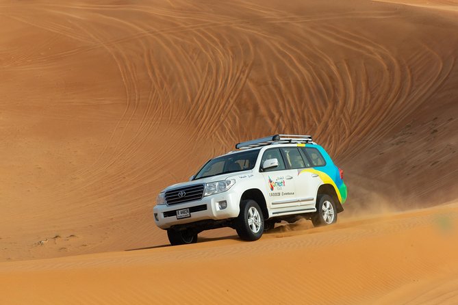Dubai Combo:City Tour and Premium Desert Safari with all Activities - Sandboarding adds a simple, active challenge