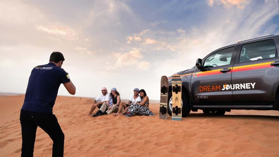 Dubai Desert Safari - Premium BBQ Dinner, Camel Ride & Shows - Sunset at the Bedouin-style camp