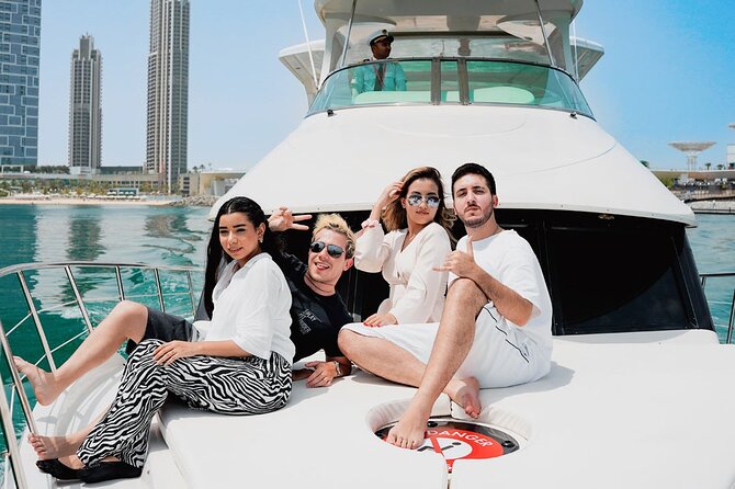 Dubai Harbour Luxury Yacht Tour with BBQ & Drinks - The yacht, crew, and shared atmosphere