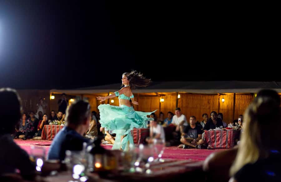 Dubai: Premium Desert Safari, Camel Ride, BBQ & Sandboarding - Why the guide matters so much