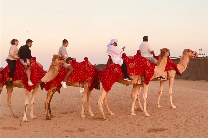 Dubai Premium Desert Safari Red Duns Camel sandbord & Premium BBQ - The optional quad bike and buggy stop