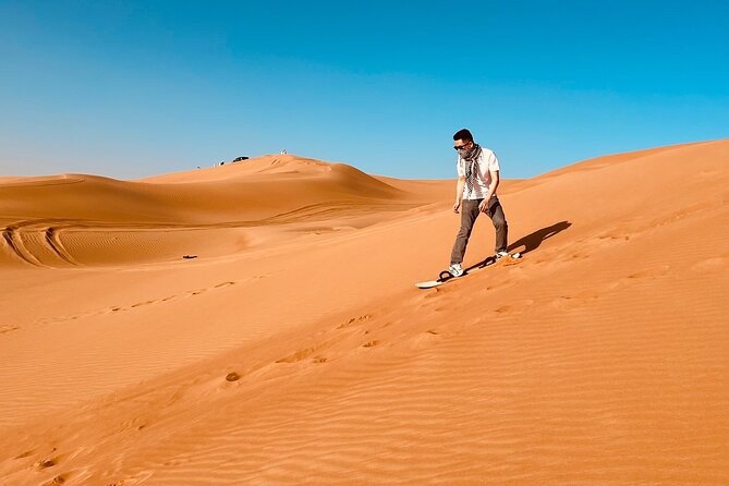 Dubai Premium Desert Safari Red Duns Camel sandbord & Premium BBQ - Dune bashing across high red sand
