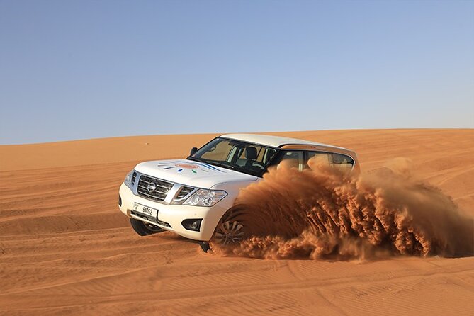 Dubai Premium Desert Safari with Live shows & Gourmet Dinner - A Dubai evening built around red dunes
