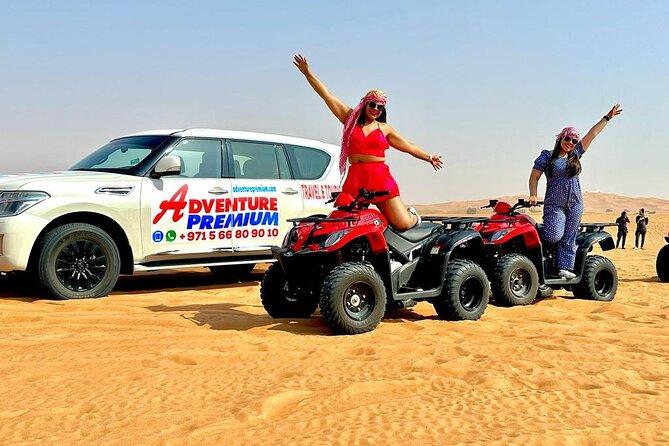 Dubai Premium Red Dunes, Quad Bike, Camel Ride, Sand Surfing & 5<em> BBQ – Quick points before you book’ /></p>
<ul>
<li><strong>Lahbab’s red dunes are the visual highlight:</strong> The desert is roughly 45 to 60 minutes from Dubai, and tire pressure is adjusted before the 4×4 enters the sand.</li>
<li><strong>The activity list is unusually long:</strong> You get dune bashing, a guided quad-bike session, camel riding, sandboarding, henna, shisha, falcon photos, and stage entertainment.</li>
<li><strong>The evening is built around a desert camp:</strong> Tea, coffee, dates, gaymat sweets, BBQ food, music, Tanoura dancing, and a fire show fill out the second half.</li>
<li><strong>A good driver matters:</strong> Positive feedback singles out drivers named Muhammad for patience, clear explanations, and photography. Momin is also praised for taking pictures.</li>
<li><strong>Crowds can affect the rhythm:</strong> Some people wait in long lines for quad bikes, while those who skip the quad activity may wait at the camp.</li>
<li><strong>The price covers a lot:</strong> At $59 per person, this is good value if most included activities run on schedule, but less appealing if delays or missing inclusions occur.</li>
</ul>
<h2>The ride from Dubai to Lahbab</h2>
<p><img width="670" height="446" decoding="async" src=