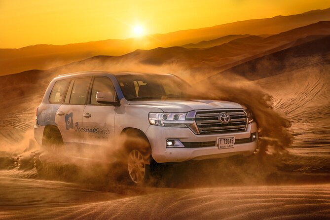 Dubai Premium Red Dunes Safari, Camels & 5<em> BBQ at Al Khayma camp – Key points to know before booking’ /></p>
<ul>
<li><strong>Red dunes near Lahbab:</strong> The tall rust-colored dunes provide the best setting for dune driving and sandboarding.</li>
<li><strong>A full seven-hour program:</strong> Pickup, desert sports, camp activities, dinner, entertainment, and the return ride make this a substantial day.</li>
<li><strong>Small vehicle groups:</strong> The 4WD can carry a maximum of six people, though the camp itself is shared.</li>
<li><strong>Strong guide service:</strong> Guides including Abid Wahid, Sunil, Rashid Mir, Shams, and Tofeeq Abbas receive especially warm praise for driving and care.</li>
<li><strong>ATVs cost extra:</strong> Quad biking is available at the first desert stop, but it is not included in the $75 price.</li>
<li><strong>Evening timing matters:</strong> Only evening departures include the fire show and stargazing. The 11:30 AM departure includes lunch instead.</li>
</ul>
<h2>Why the Lahbab red dunes make a difference</h2>
<p><img width="669" height="446" decoding="async" src=