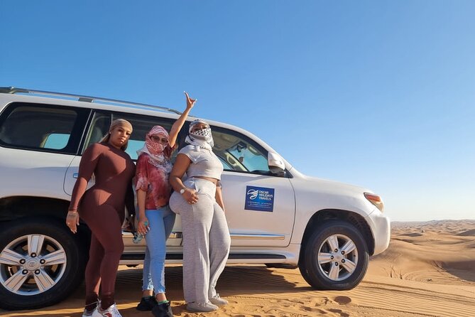 Dubai Red Dunes with Sandboarding, Camel Ride, Falcon & VIP Camp - Bedouin-style camp and a full evening program