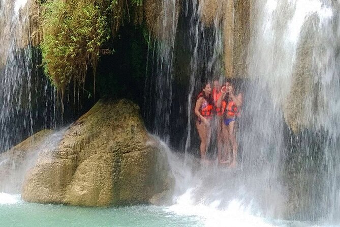 Erawan Waterfall and Kanchanaburi Private Tour [Optional Luxury] - The long-tailed boat and the optional Chong Kai cemetery