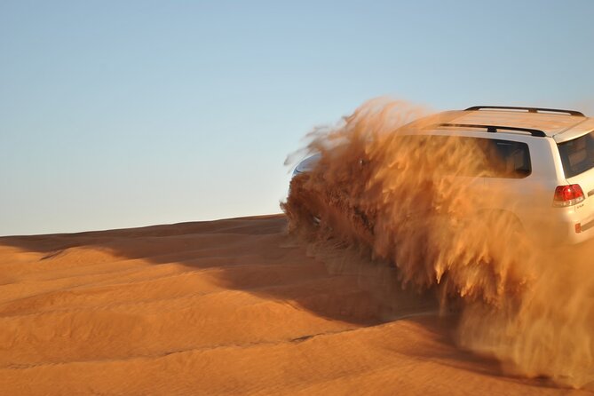 Evening Desert Safari Tour with Sand Surfing, BBQ Dinner (Exclusive Car) - Leaving Dubai for the red dunes