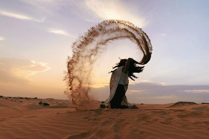 Evening Desert Safari Tour with Sand Surfing, BBQ Dinner (Exclusive Car) - Camel riding and a traditional camp welcome