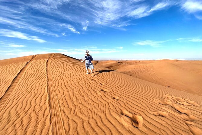 Exclusive Desert safari - Sand boarding and the short camel ride