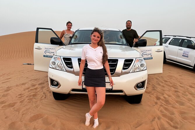 Exclusive Desert Safari Camel Ride Sandboard & Buffet BBQ Dinner - Lahbab’s 40-minute dune drive and sandboarding