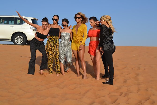 Exclusive private vehicle, front table, food served by Buttler - Sunset photographs and optional sandboarding