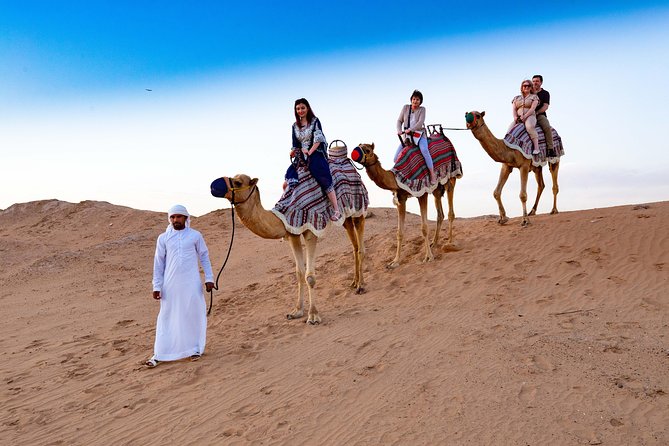 Exclusive private vehicle, front table, food served by Buttler - Lahbab’s red dunes and the 25-minute dune ride