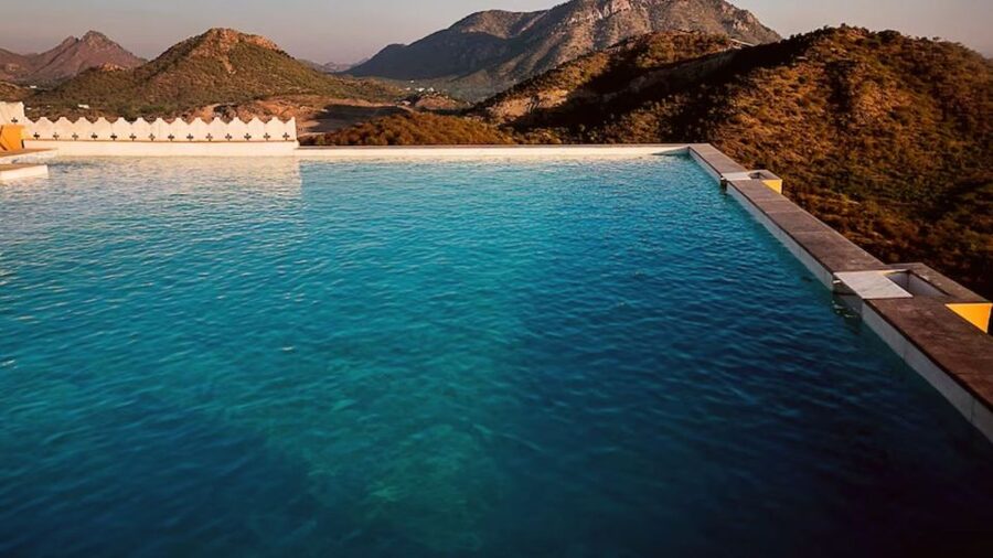 Experience Luxury: Private Museum, Vintage Car Ride - What makes Fateh Garh different from central Udaipur