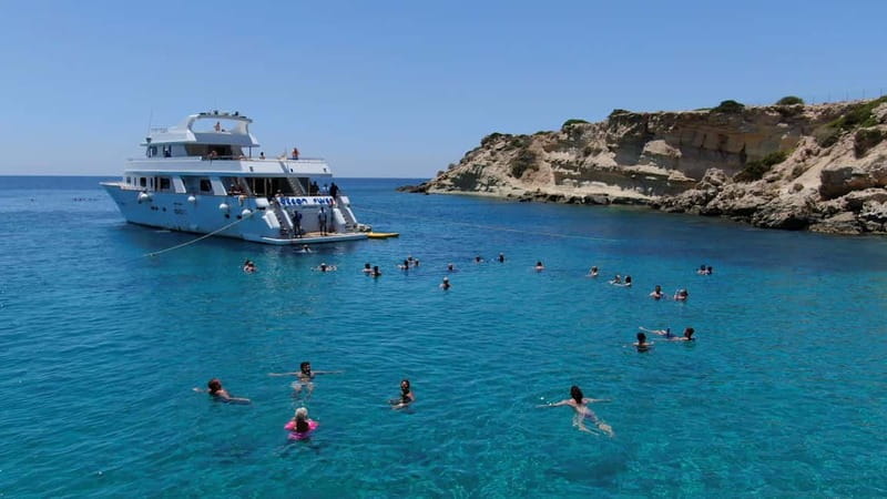 From Pafos: Ocean Flyer VIP Cruise - Adults Only - Sea caves, Coral Bay, and the western coast