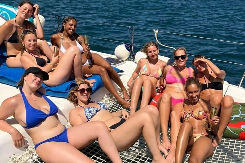 From Palma: Luxury Catamaran Group Tour with Tapas & Drinks - Tapas, welcome drinks, and extra costs